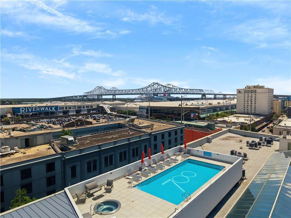 Shared rooftop swimming pool and Crescent City Connection